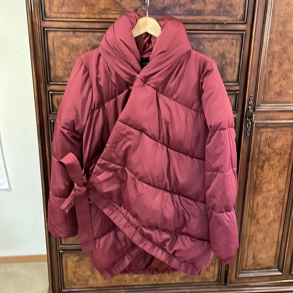 NWOT Universal Standard woman’s maroon puffer coat. It's called the kanda puffer